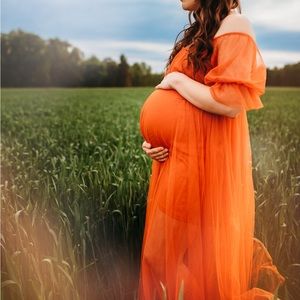 - Orange/ auburn maternity dress.